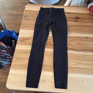 Lululemon leggings. Size 2. Leg pocket. Zip in rear. Great condition